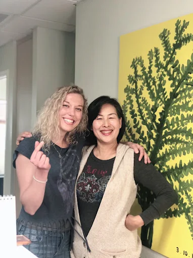 Lauren and Jin smiling together at the San Diego Meditation Center